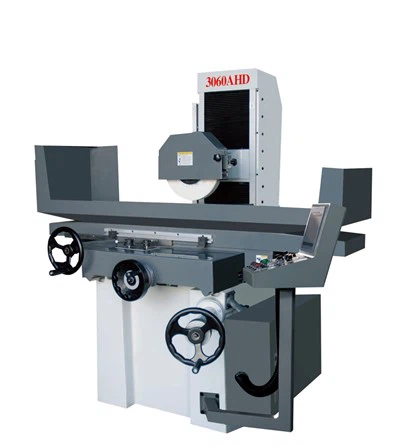 How to ensure the smooth operation of the spindle in a surface grinding machine?